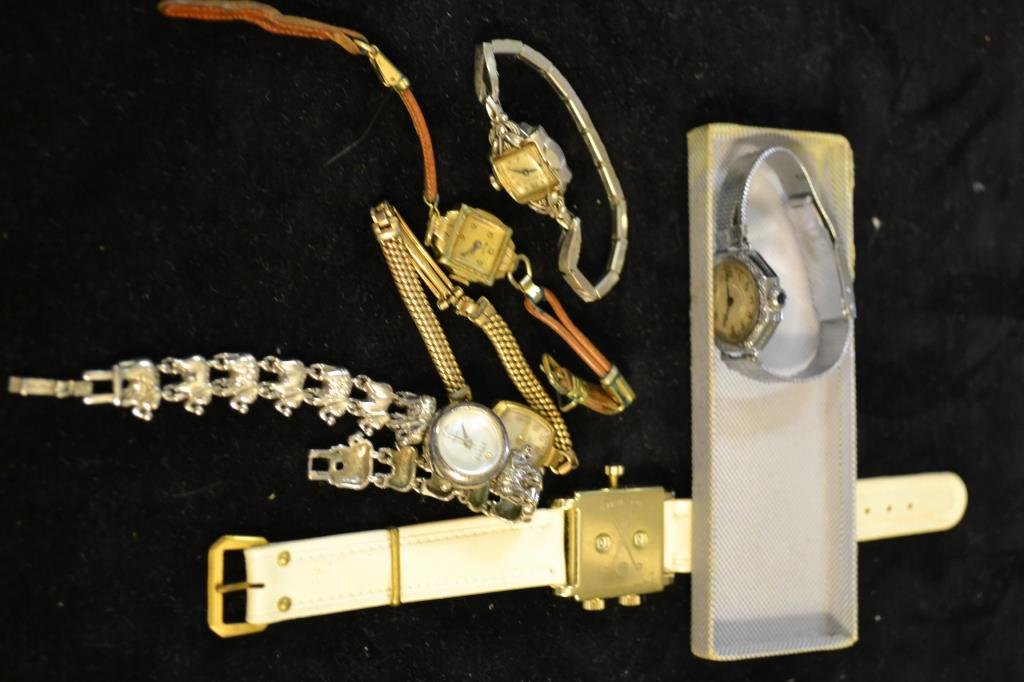 Watch Lot: Large grouping of wrist watches, includes two 10K GF (Bulova and Benat), a 14K GF Omega, and a Sinclair with a Sterling Case and Band