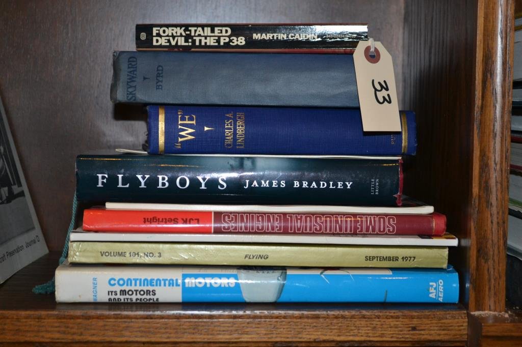Collection of Aircraft Auction Catalogs and Unusua: Fork-Tailed Devil: The P38, by Martin Caidin (1973) "we", by Charles A. Lindbergh (1927, First Edition) Skyward, Richard E. Byrd (1931) Flyboys, by James Bradley (2003) Christie's Auction Catalog, Mon