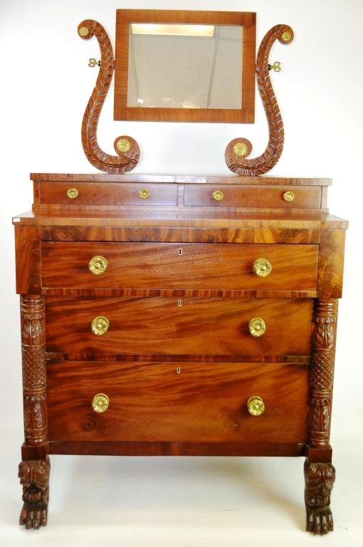 Classical Mahogany Dresser circa 1860: Classical Mahogany dresser circa 1860, with heavily carved harps supporting mirror, Brass Scottie dog accents over glove drawers, carved columns, all supported by paw feet, standing 65"h x 38"w x 19.5