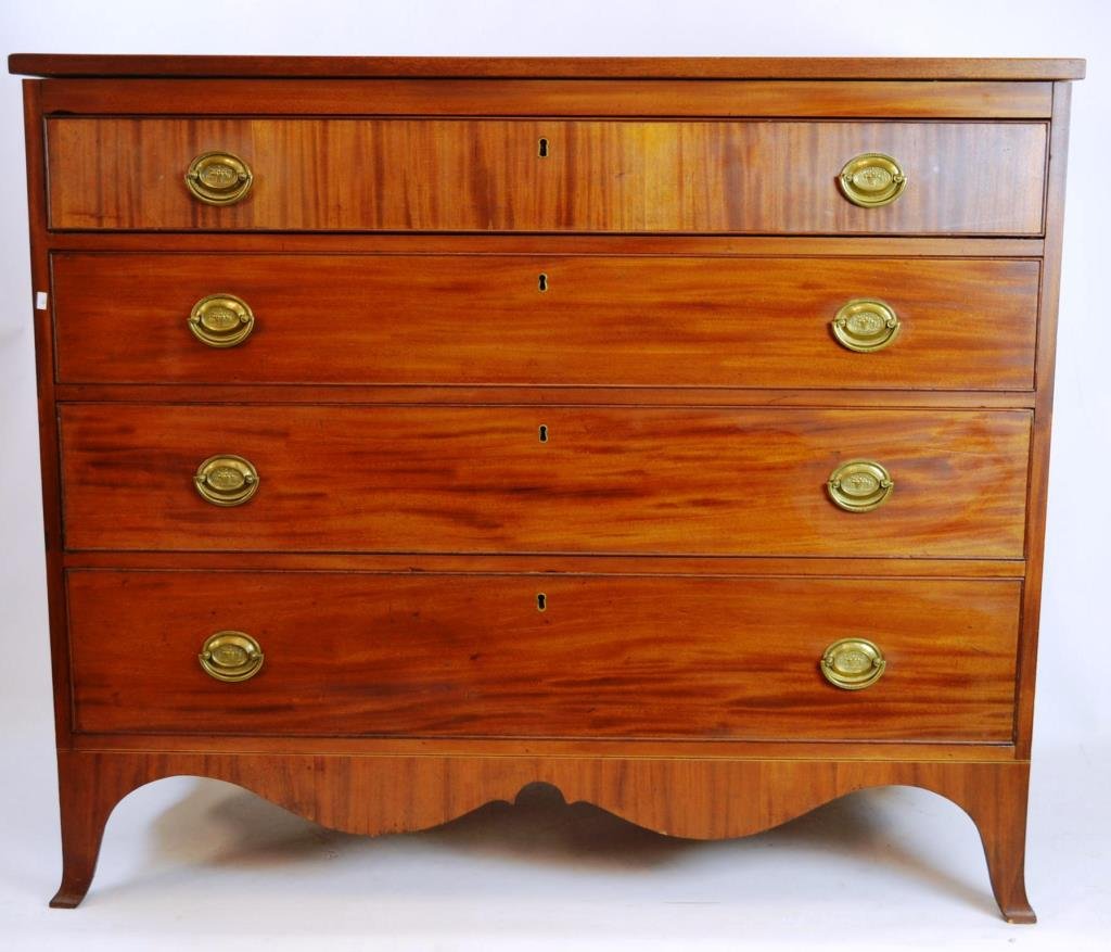 Mahogany Hepplewhite Chest of Drawers: Mahogany Hepplewhite chest of drawers with four graduated drawers over crotch grain mahogany apron, supported by French Feet, standing 38.5"h x 48.5" W x 21.25"D