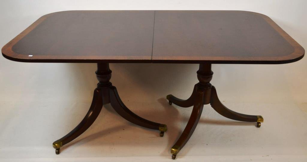 Hepplewhite Style Dining Table: Hepplewhite style dining table with two leaves (each measuring 20"w) table measures 29.5"h x 68"w x 44"D