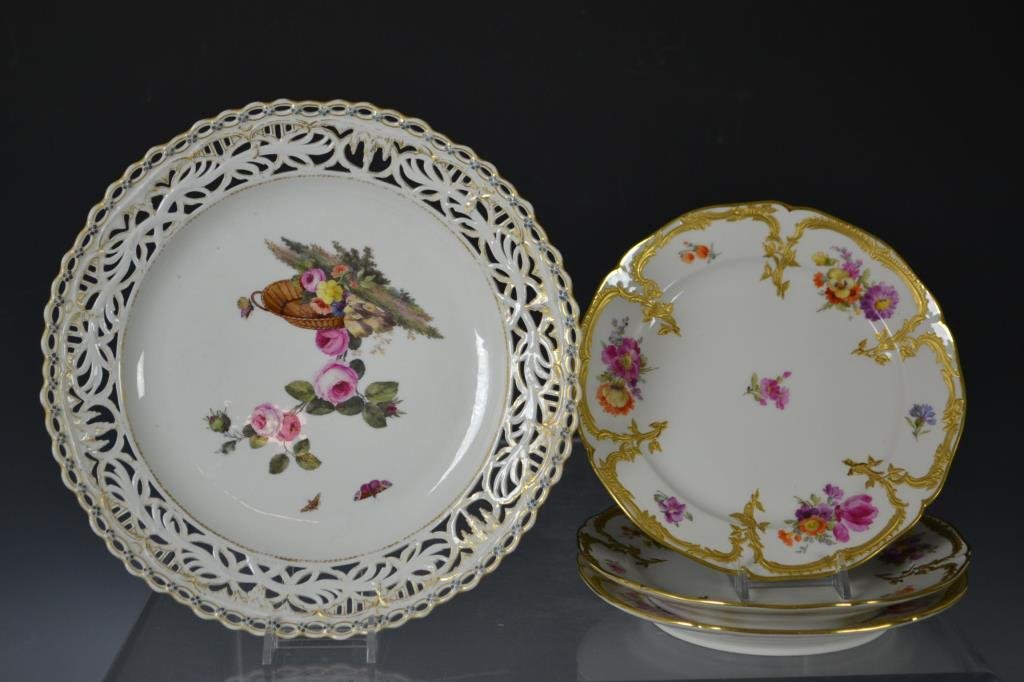 Three KPM desert plates: Three KPM dessert plates with gilt and floral motif, and a KPM cake plate with pierced border