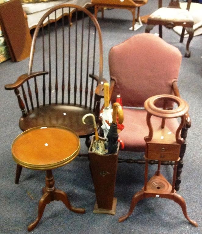 Decorator Grouping: Decorator lot including large-scale Windsor style armchair, another chair, wig stand and a small round table along with umbrella stand with vintage umbrellas including a silk umbrella and a Barbie umb