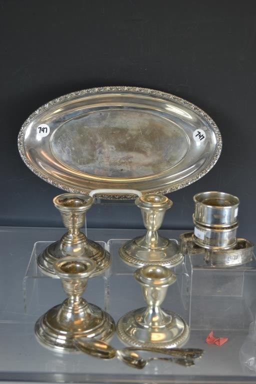 Sterling SIlver: Sterling Silver including four weighted sterling silver candlesticks, four Sterling Silver napkin rings, 11.25" Sterling Silver tray, Sterling Silver spoon, and a Sterling Silver baby spoon