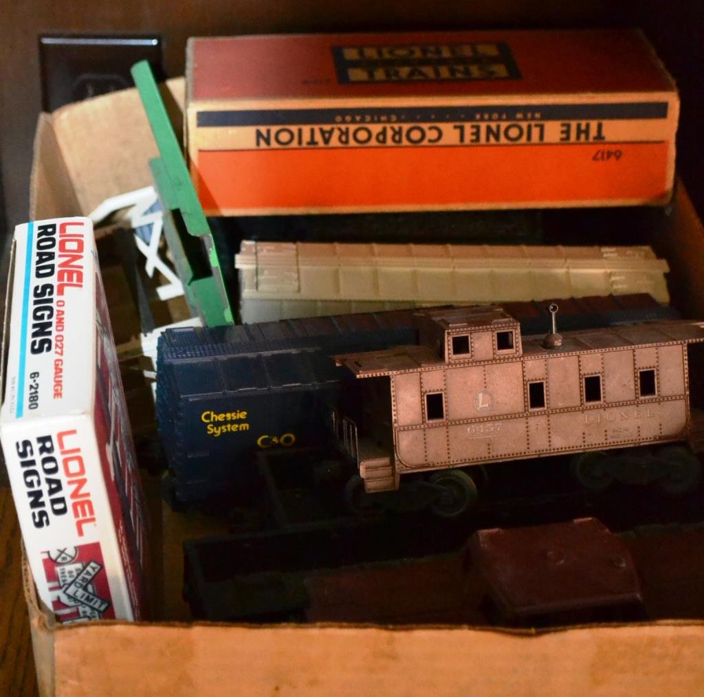 Lionel Post War Train Engine 2037: Lionel post war Train Engine and Tender 2031, along with a Lionel 3472 Automatic refrigerated milk car, a Milk Car Platform , PA RR Gondola, C&O Box Car, NYC Gondola, and a PA RR Caboose and a 6457 Ca