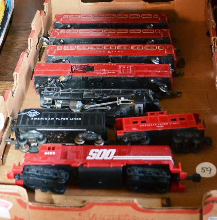American Flyer Trains and Cars: American Flyer trains and cars including an 21161 steam engine and tender, a 24636 Caboose, 650 passenger car (three) 718 agency car, along with an unrelated Erty diesel locomotive,