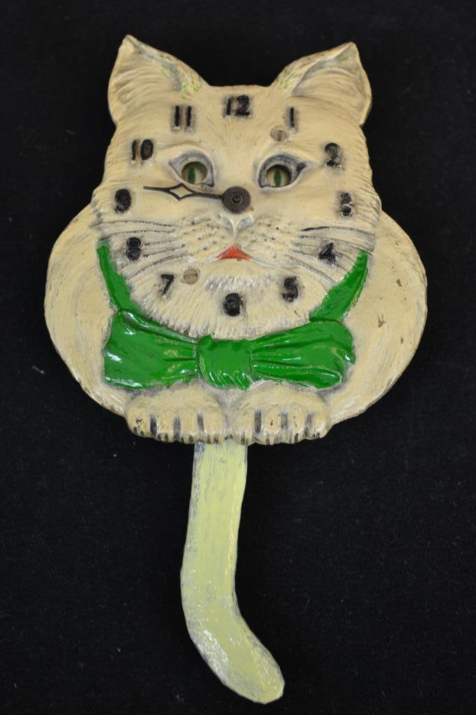 Lux Clock Mfg. Wagging Tail Cat Clock - White Kitty: Lux Cat clock with motion eyes and ''wagging'' tail, white with green ribbon - appx 8"H