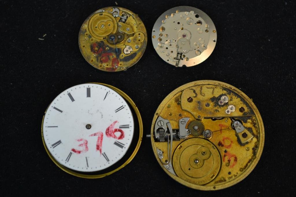 Three Patek Pocket Watch Movements and Another: Four watches including; two Patek watch movements; neither has a dial, one numbered 2583 and the other with no number, a small Patek pocket watch movement # 99306 (has no face, movement only) and a Sw