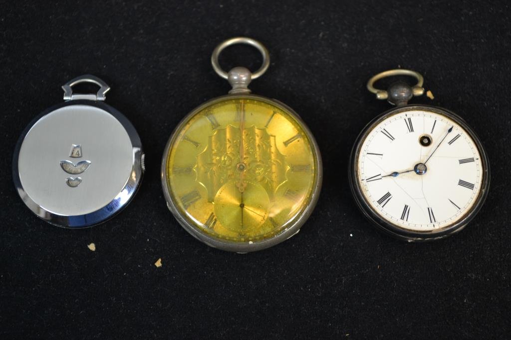 Three Pocket Watches; M.J. Tobias & two Swiss: Three pocket watches consisting of; a Swiss digital pocket watch with stainless steel case, a small Swiss pocket watch with a cracked dial in a silver case, and a M.J. Tobias key wind pocket watch wit