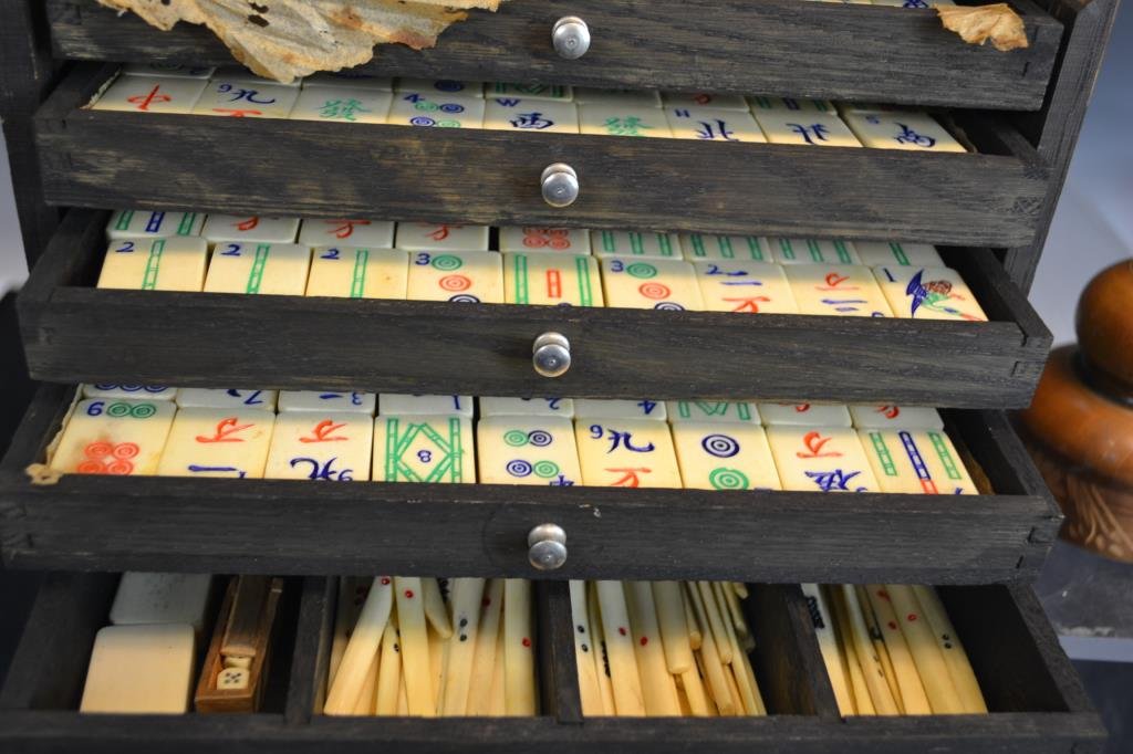 Early 20th C Mah Jong Set: Vintage Mah Jong set, appears to be complete, comes in original wooden box, along with an Asian Ball and Cup game