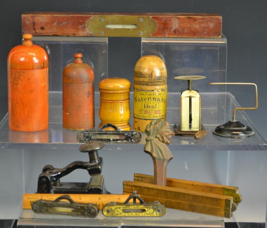 Grouping of Victorian Office Supplies: Grouping includes; a small wooden ink box marked "Waterman's Ideal Ink" along with two other small wooden boxes, a Wagner's York PA 6" ruler, a stamp scale, two folding rulers, and two small bubblelev