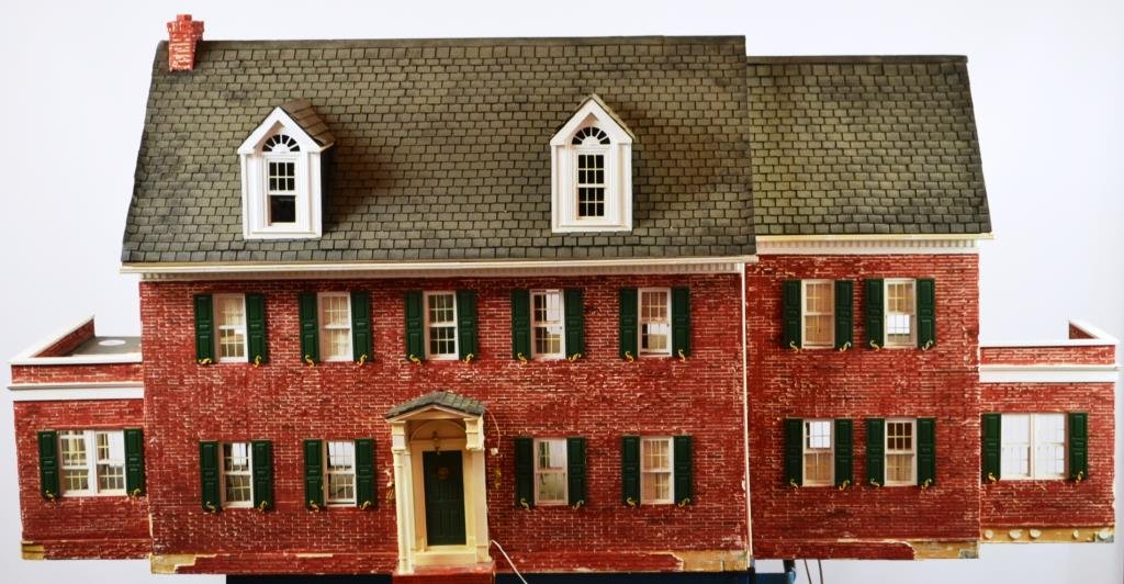 Large Scale Model of a Colonial Home: Scale model or Dolls House of a Colonial home, made from plaster, wood, and asphalt shingles - masterfully crafted in Doll House Scale, measuring 38"H x 78"W x appx 29"D, minor loss