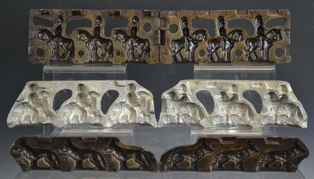 Three Early Clear Toy Candy Molds: Three Early Clear Toy candy molds including; a Cast Iron dog, an Alumanum boy riding a horse, and a Soldier riding a horse