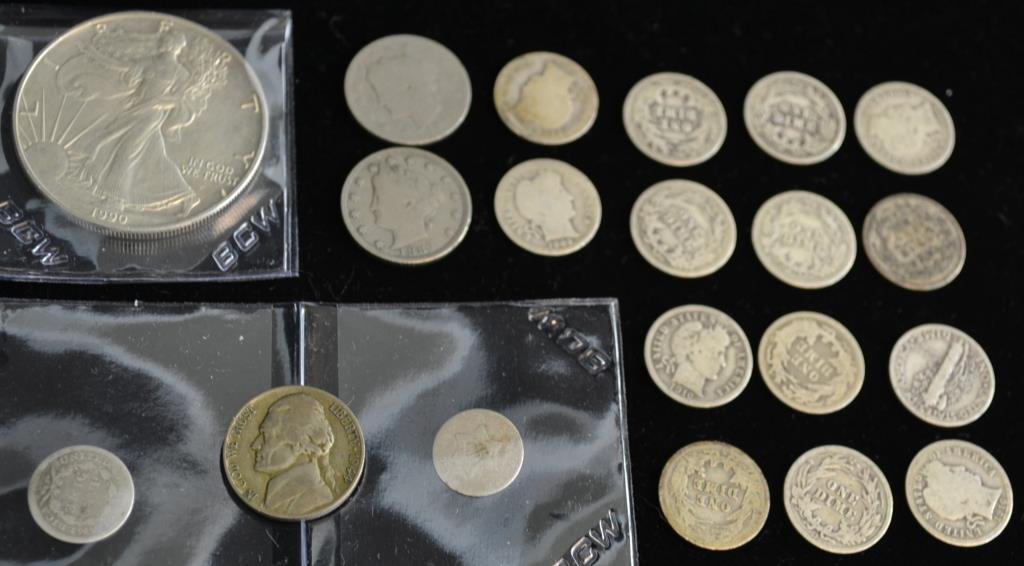 Lot of US Silver Coins: Lot of 17 Silver US coins: 1 American Silver Eagle, 14 Silver Dimes, 1 Half Dime and an 1853 Silver three cent piece. Lot also includes 3 US nickels (1883 "No Cents" and 1 war nickle)