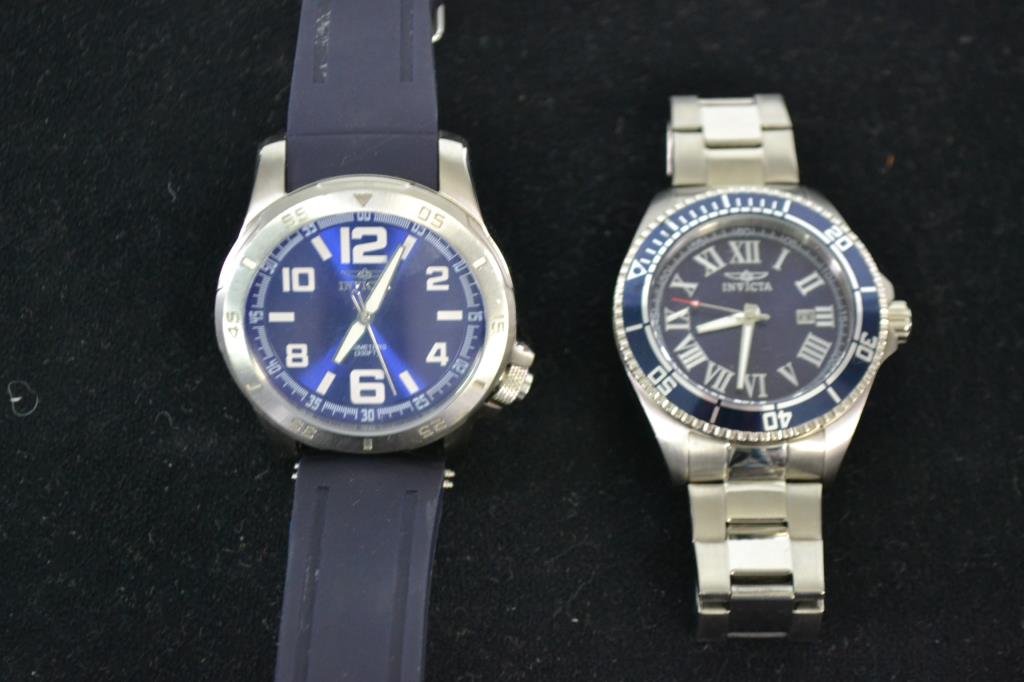 Two Invicta Watches: Two Mens Invicta watches, one marked Model 1903 Tritnite Night Glow, and the other marked Pro Diver Model #14999