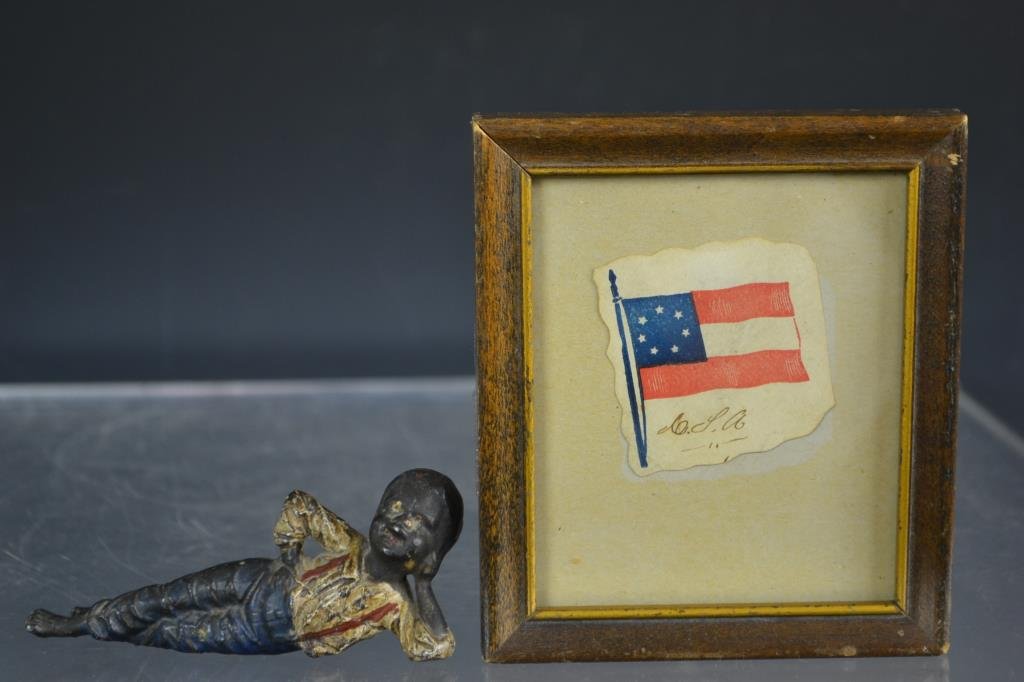 Black Americana and Confederate States of America: Grouping includes a painted Cast Iron figure of a young black man, and a water color picture of the 7 stars/3 bars Confederate flag