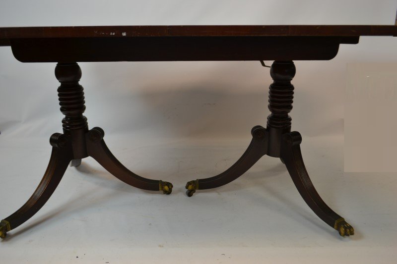 Two Pedestal Dining Room Table: Duncan Phyfe style two pedestal dining room table, with Bass claw feet, two leaves (in protective storage crate) table measures 30"H x 44"W (without leaves) x 84"L