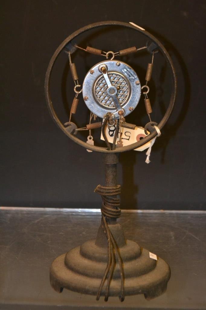 American Microphone Circa 1920: 1920's era Microphone by the American Microphone Company, Los Angles manufacturer's mark, also marked "Made In USA" mounted on a cast iron stand