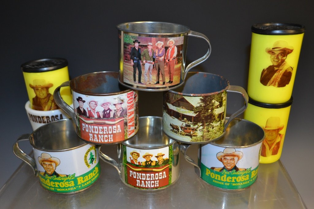 Bonanza Tin Cup Collection: Collection of six collectable Bonanza tin cups along with three lidded German souvineer cups marked Siroconfi with Ben, Hoss, and Little Joe - also includes Jim Beam Bonanza bottles (bottles not pictu