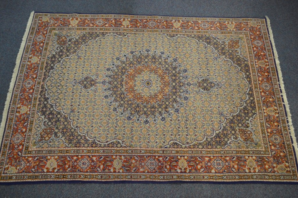 Hand Woven Persian Carpet: Hand Woven Persian Carpet measures 80.5" x 118" Internal reference #74Discoloration on 2 sides of rug, some repair work to the fringes, equal fading through out rug, no tears or rips