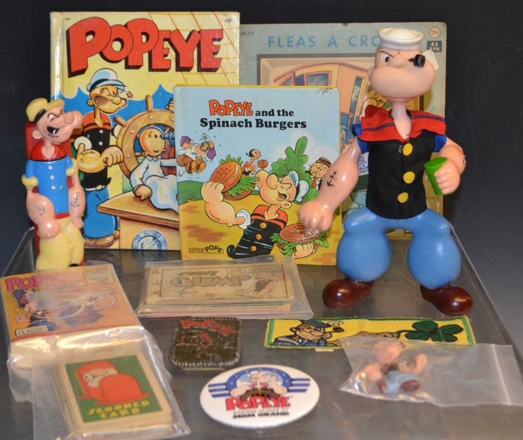 Grouping of Popeye Collectibles: Grouping of Popeye collectibles including; Popeye game cards, Andy Grump comic book, 45 record, Big Little Books titled "Popeye and Queen Olive Oil", and a belt buckle and patch.