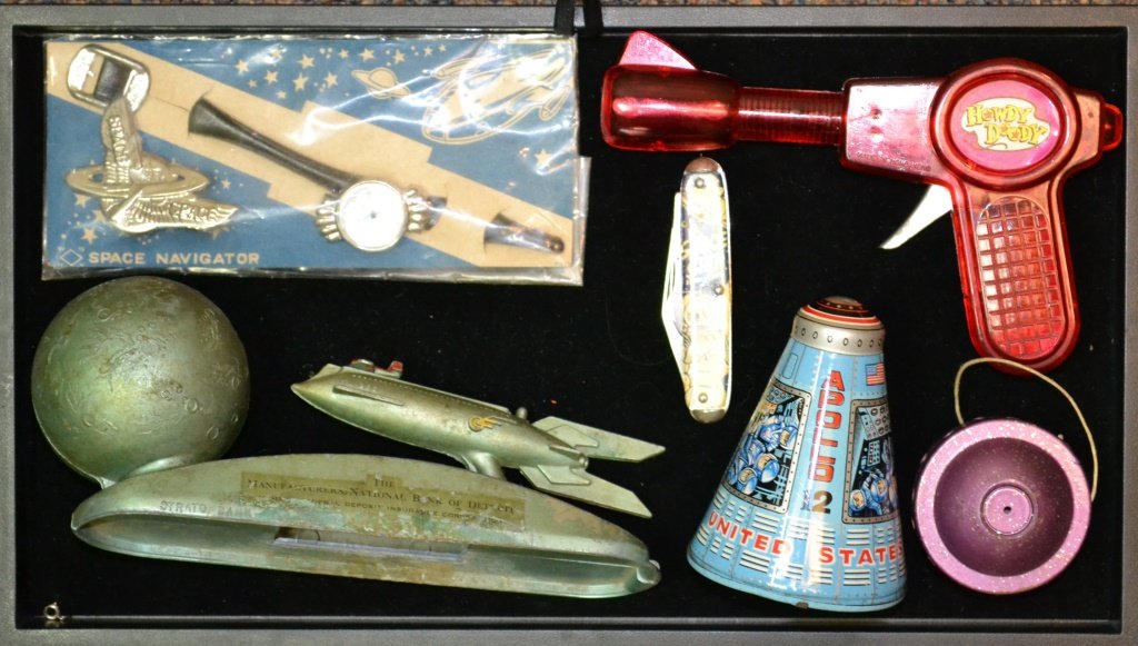 Collection Of Vintage Space Related Toys: Collection of vintage space related toys including a 1960's Japanese Horikawa tin litho Apollo 12 capsule, a 1950's rocket ship bank marked "Strato Bank from the Manufacturers Bank of Detroit" a foldi
