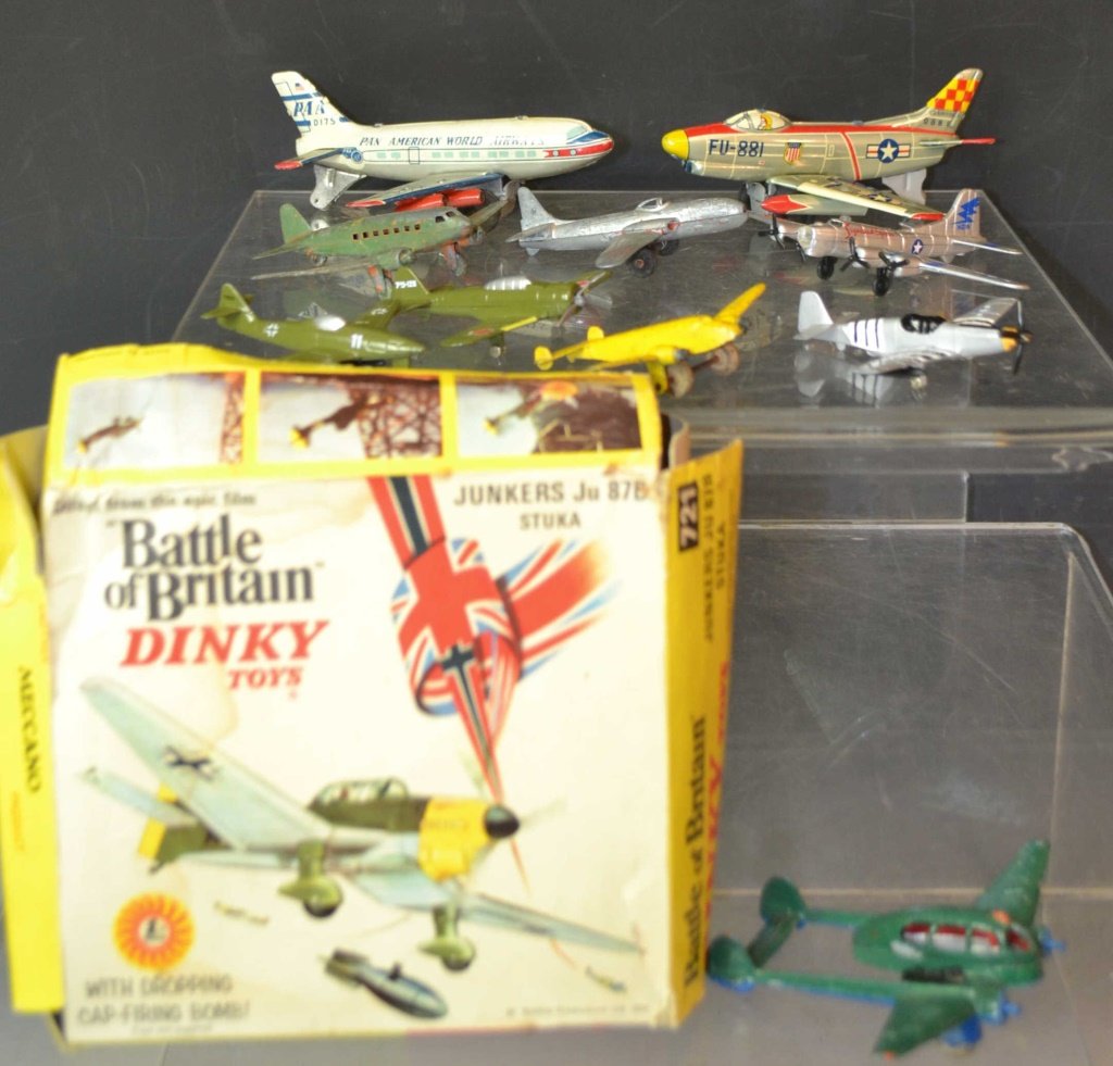Four Dinky Toys: Four Dinky toys including; Junkers JU 87B Stuka w/ original box, Army trench w/6 paper soldiers includes grouping of lead soldiers & airplanes