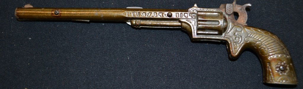 Buffalo Bill Cap Pistol In Good Condition: Buffalo Bill Cap Pistol in good condition, retaining most of its original paint , 11 Â½â€ long