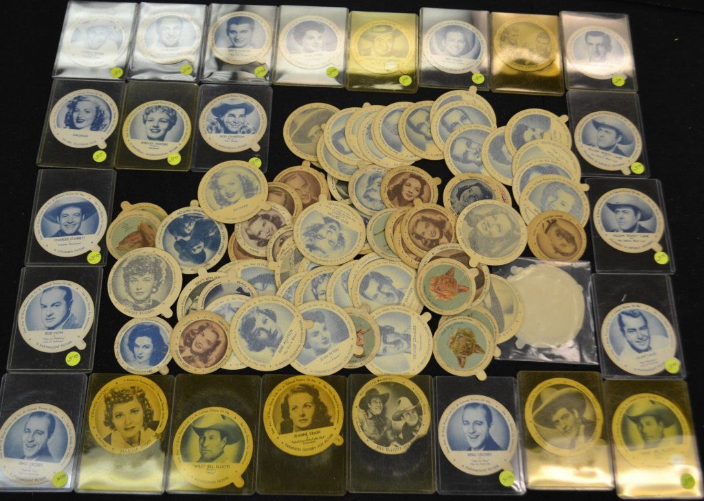 A Collection of Famous Faces Under The Dixie Cups: A collection of famous faces under the Dixie cups including Ginger Rogers, Mitzi Gaynor, Wild Bill Elliot, Stewart Granger, Penny Singleton, Shelly Winters, Rod Cameron and many others