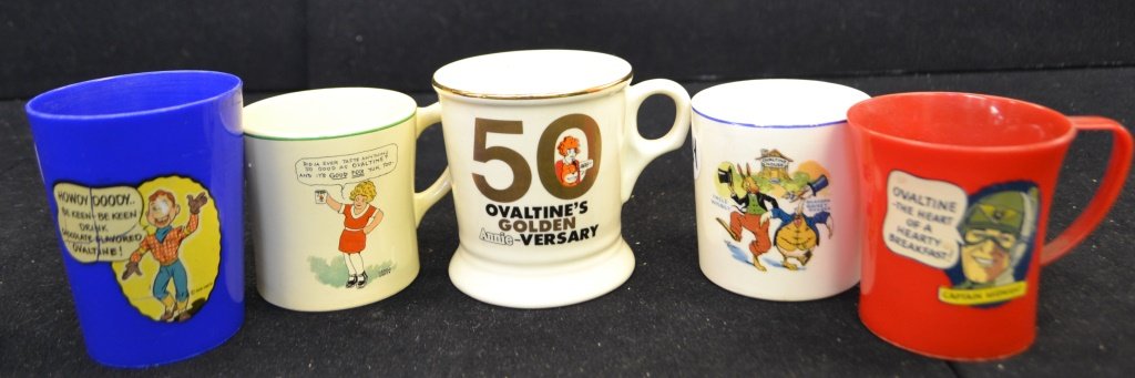 5 Little Orphan Annie and Other Ovaltine Cups: 5 Little Orphan Annie, Captain Midnight, Uncle Wiggily, and Howdy Doody (as-is) Ovaltine cups. All are different with colors including red, blue, and white. Three are ceramic and two are plastic.
