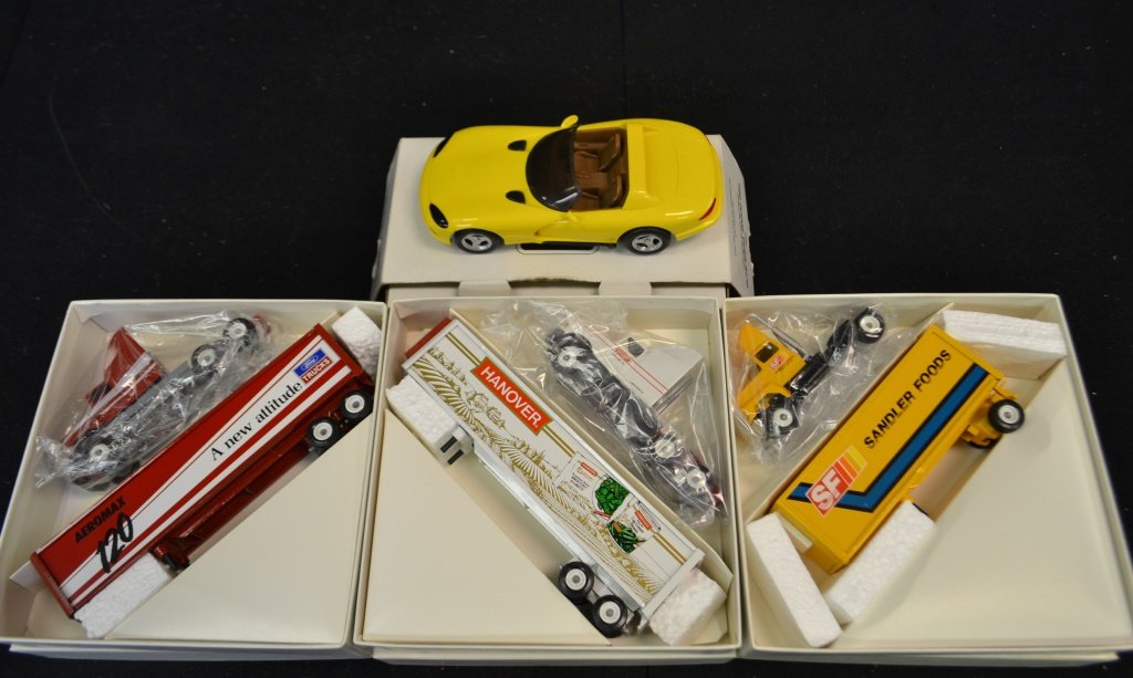 Three Winross Trucks in Original Boxes w/ Another: Four Winross Trucks in original boxes including Sandler Foods, Aeromax, and Hanover and other maker Ertl car 1994 Dodge Viper