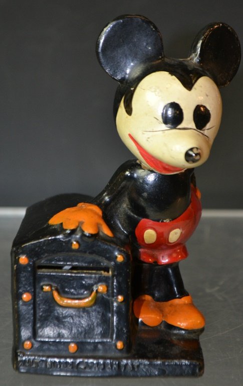 Walt Disney Mickey Mouse Coin Bank: Painted composition coin bank marked Walt Disney Crown Toy, Made in USA; 6in. H