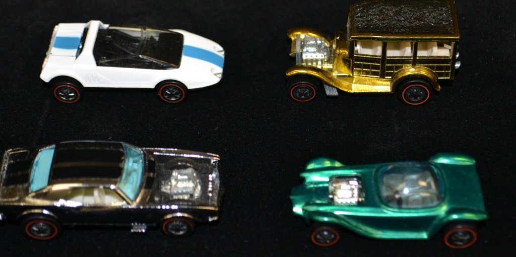 Grouping Of Four Vintage Red Line Hot Wheels: Grouping of vintage Red Line Hot Wheels including; White Jack Rabbit Special, Gold 31 ford Woody, Silver Heavy Chevy, and Green Beatnik Bandit excellent condition