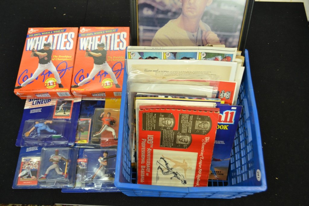 Collection Of Sports Memorabilia & Epherema: Collection of sports memorabilia & epherema including Cal Ripken error Box of Wheaties, Michael Jordan Wheaties, Sport Legends, Starting Lineup Cal Ripken, Eric Davis, Mike Mussina, and George Brett a
