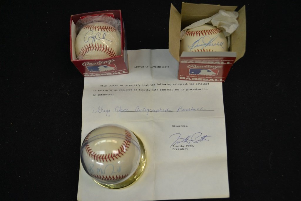 Three Autographed Oriole Baseballs: Three Autographed Oriole Baseballs including Ben McDonald, Gregg Olson w/ COA, Boug Powell