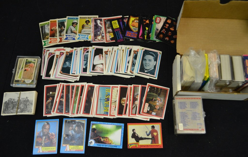 Mixed Lot Of Non Sport Cards: Mixed lot of non sports cards including Desert Storm, cheerleaders, golf, Elvis(78) , Dick Tracey, Gremlins 2, Power Rangers, Superman, Star Wars, Mash, Zero Heroes, Combat Cards (63) Batman 1966, G-m