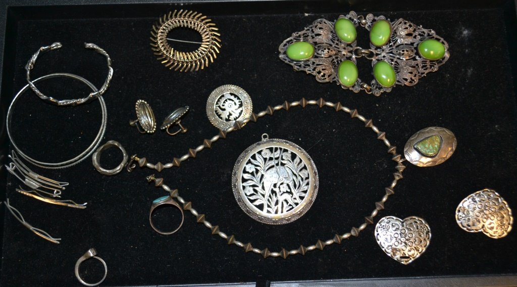 Grouping Of Silver/Sterling Silver Jewelry: Grouping of Silver/Sterling Silver Jewelry including a Danecraft Silver Pin, Mexican Sterling Silver Pin marked TG, Native American necklace and pendant, and various other items. *Note* Due to fraudul