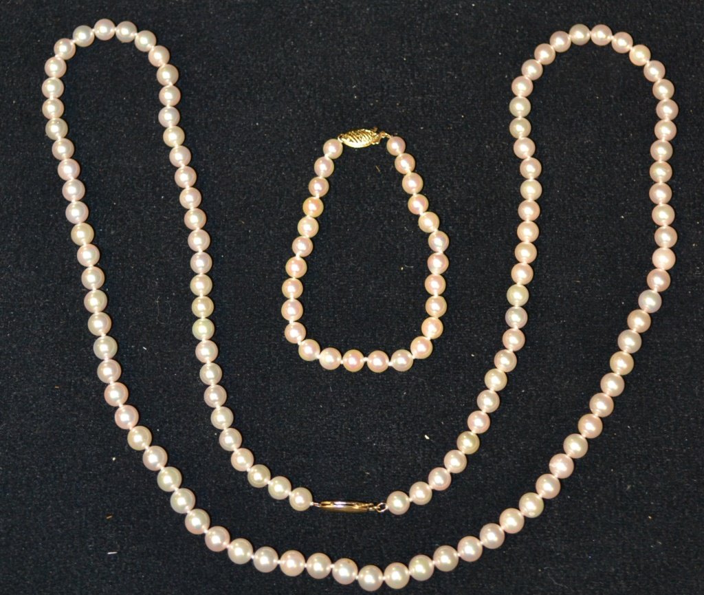 Mikimoto Cultured Pearl Necklace and Bracelet: Mikimoto Cultured Pearl necklace and bracelet, with 14K Gold clasps; total length of necklace is 30"