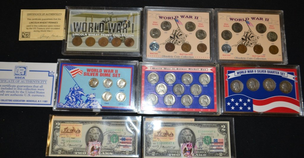 Five WWII Coin Sets and Others: Five WWII Coin Sets and Others including WWI Penny Coin Set, and (2) 1976 Bicentennial $2 Bills. *Note* Due to fraudulent transactions Keystone Auctions may require cash, money-order or wire transfers
