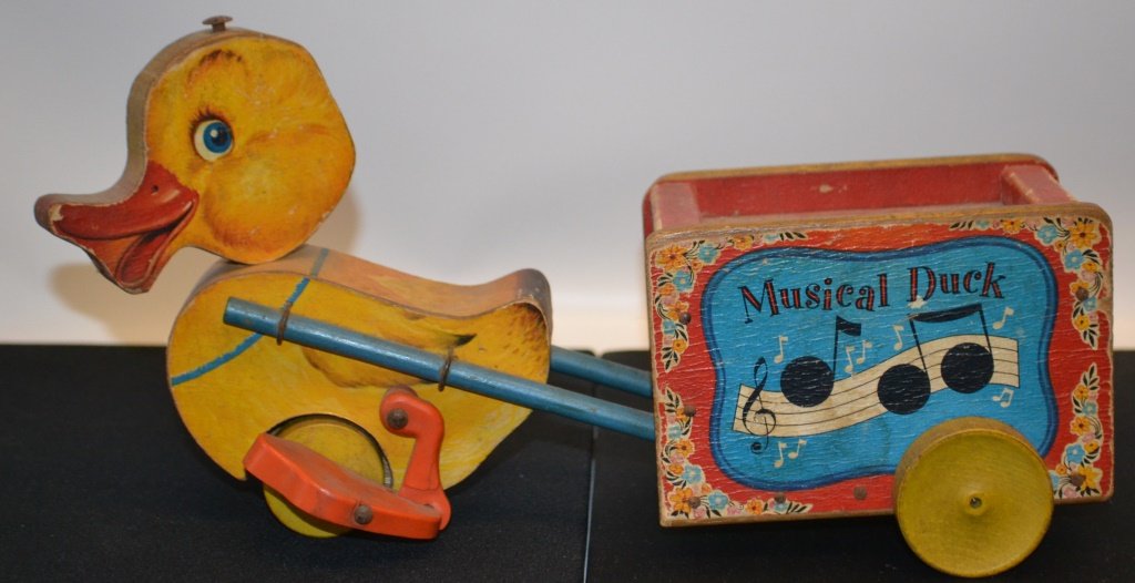 Fisher Price Duck Pull Along Toy: Fisher Price Duck Pull Along toy (missing string) minor loss to paper on duck body, minor crazing to paper on box