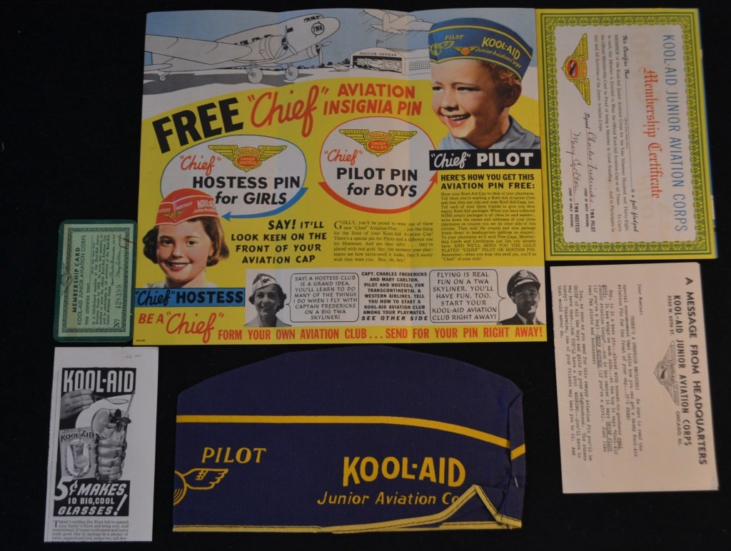 1938 Kool Aid Junior Aviation Club Papers & Prem: 1938 Kool Aid Junior Aviation Club Papers and premium including: Kool Aid pilots cap and original mailer, membership certificate, membership card, magazine advertisement, and a message from headquarte
