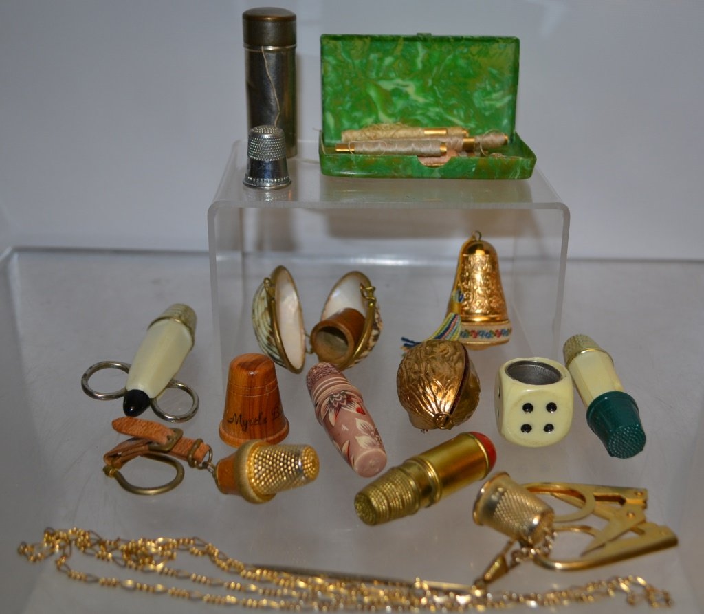 Group of Sewing Accessories: Group of sewing accessories including: chatelaine, 19thC. bone needle case and thimble, 5 later needel cases / sewing kits, brass walnut thimble case, shell thimble case, wood thimble, and etc.
