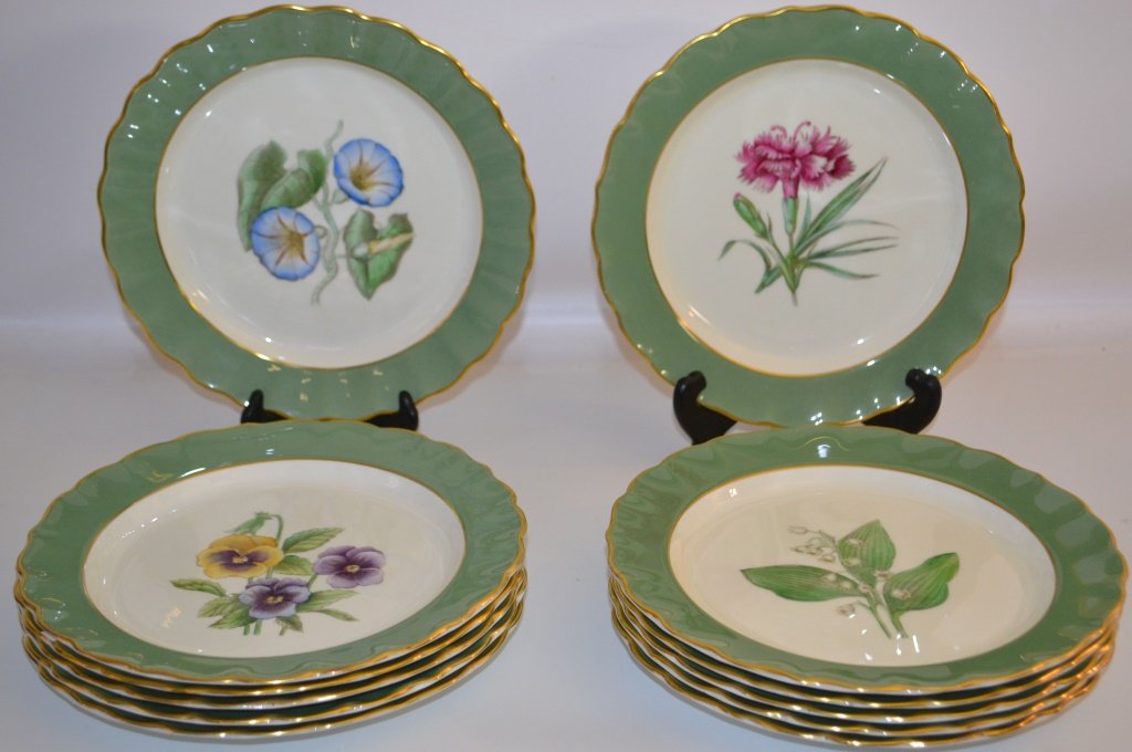 Twelve A. H. Williamson Royal Worcester Porcelain: Twelve 9" A. H. Williamson Royal Worceseter Porcelain fower plates; green rim with gillt trim, each with a different flower including; Polyanthus, Wallflower, Tulip, Pansy, Poppy, Pinks, Lilly, Rose, 