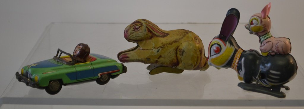 Japanese and USA Tin Toys: Japanese and USA tin toys, J. Chew And Company keywind hoppity horse, Japanese friction car driven by monkey, hoppity bunny