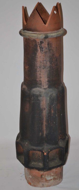 Terracotta Chiminea Topper: Terracotta chiminea topper marked "The Champion chiminea pot 157"; measuring 46.5 in H x 13 in diameter tapering