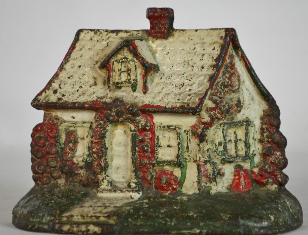 Late 19th Early 20th C Cottage Cast Iron Door Stop (1 of 2)