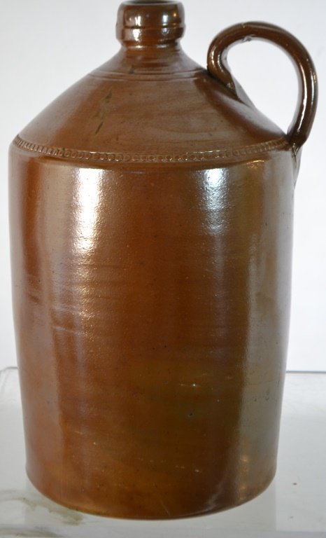 Unmarked Redware Jug: Unmarked redware jug; measuring 12 in H