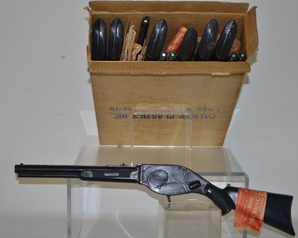 Box of 12 clicker water rifles (1 of 3)