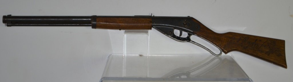 Red Ryder BB gun: Daisy Red Ryder carbine. Appears to be in working order. Finger guard is cracked.