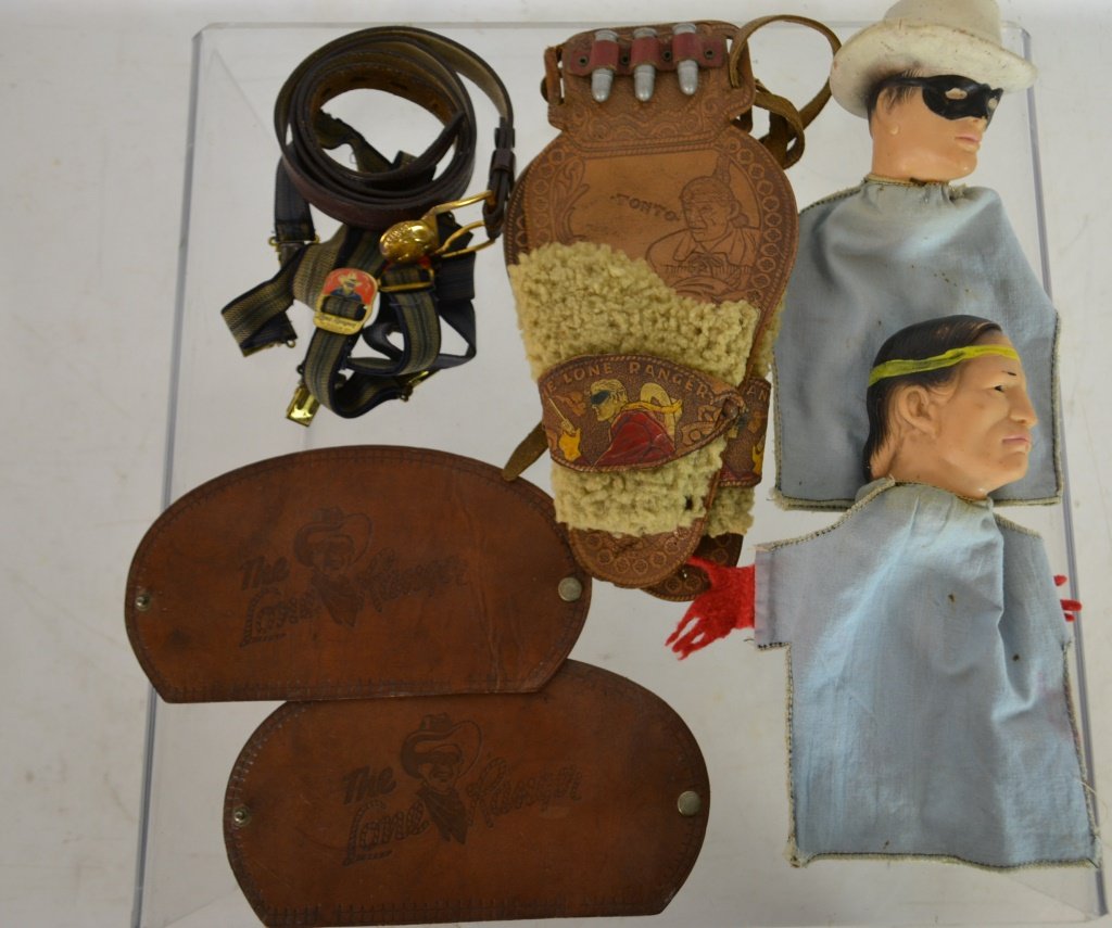 Grouping of Lone Ranger Items: Grouping of Lone Ranger Items including: (2) hand puppets, Lone Ranger Gun Holster, (1) Lone Ranger Belt, (1) pair of Lone Ranger Suspenders, 1 pair of leather sleeve protectors